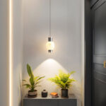Modern-style oval pendant light with a faux marble finish, featuring an elegant design and a lens light source at the bottom that provides soft, ambient illumination.-986 - Image 2