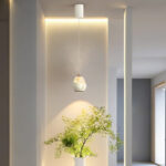 Modern creative mountain-shaped pendant light featuring a lens light source at the bottom-958 - Image 5