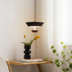 Modern creative inverted triangle pendant light featuring a lens light source at the bottom-959