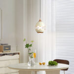 Modern creative eggshell crack-shaped pendant light featuring a lens light source at the bottom-945 - Image 3