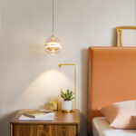 Modern creative Danish planet-shaped pendant light featuring a lens light source at the bottom-964 - Image 4