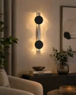 Minimalist Rotatable LED Wall Light in Black and Brushed Silver - Image 3